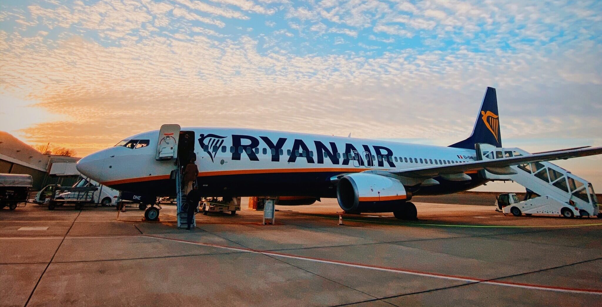 Ryanair plane at sunrise on tarmac at airport