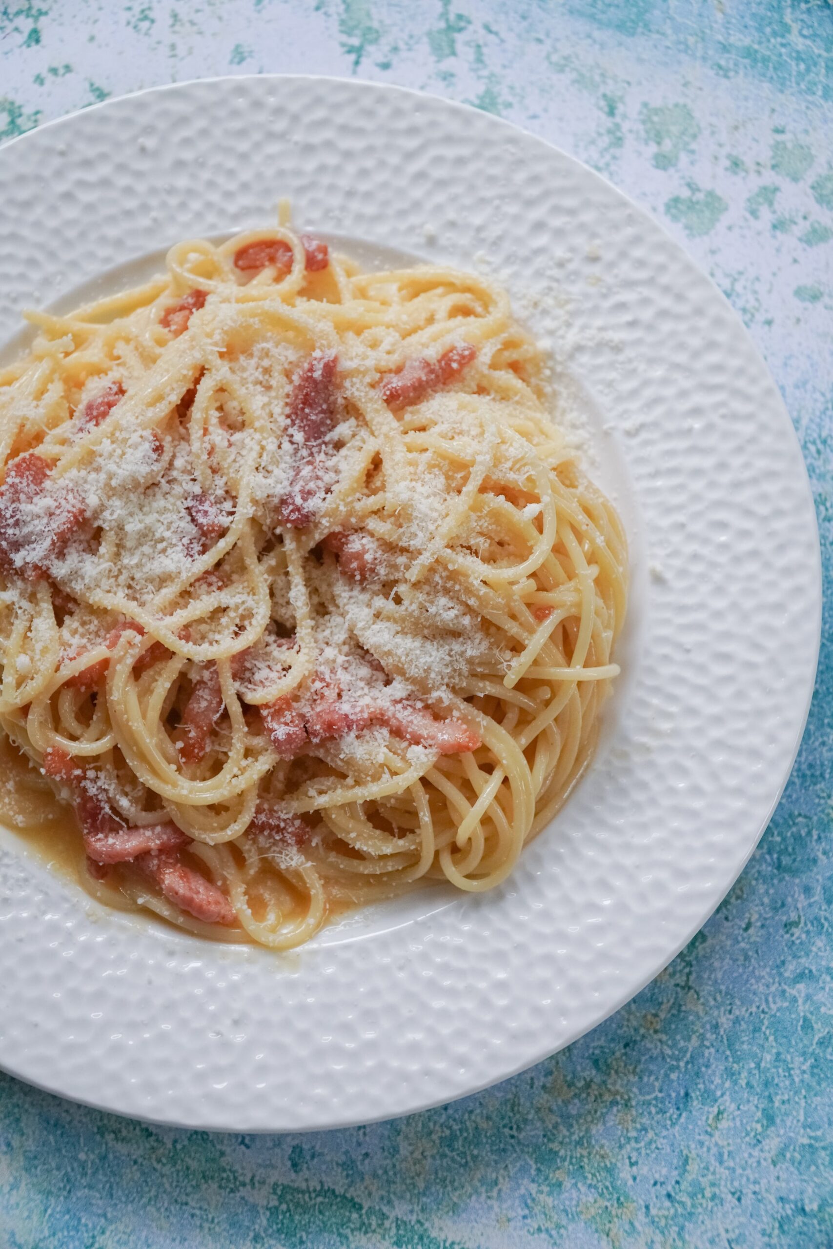 Plate of spaghetti carbonara taken from above